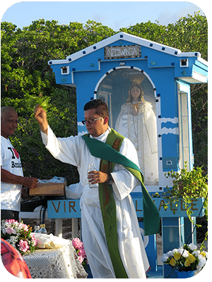 A priest blesses the congregation.