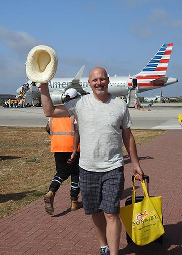 A visitor arrives on American Airlines' inaugural flight to Bonaire.