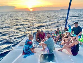 A large group enjoying a sunset cruise